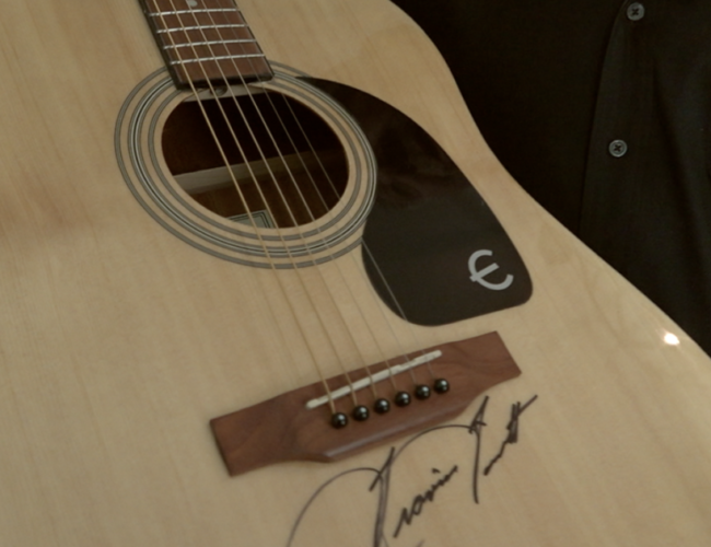 Cody Johnson, Zach Top, Ronnie Dunn, Travis Tritt, Riley Green & More Sign Guitars To Support Wounded Officers Working California Wildfires